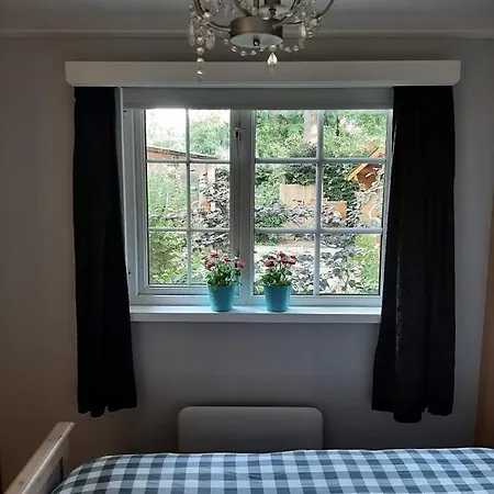 Woudthuisje Vakantiehuis *